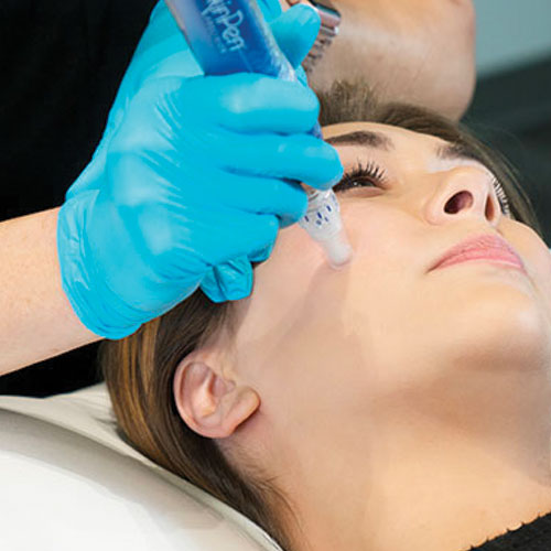 A woman undergoing a facial treatment